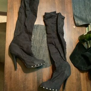 Thigh high black boots